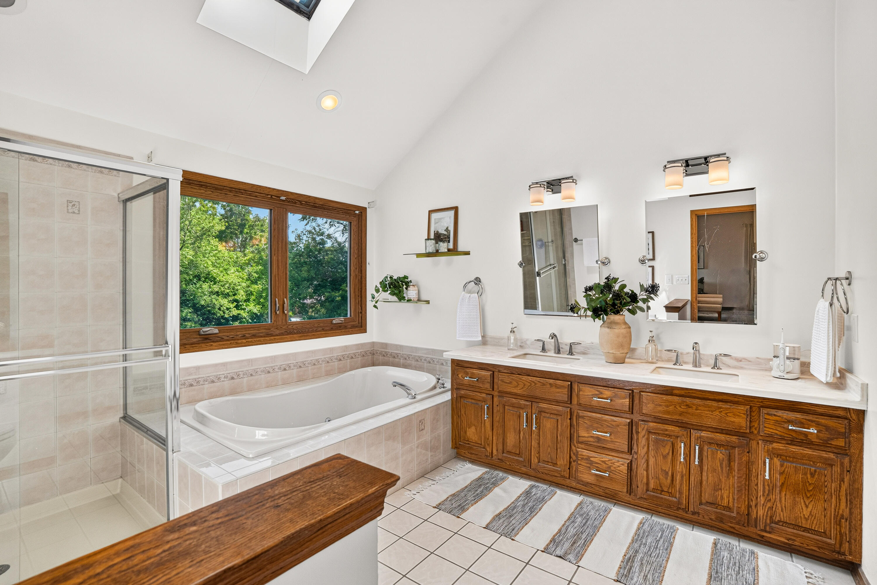 17445 St James Road Brookfield, WI 53045 - Photo 27 of 49 Master En-Suite Bathroom w/ Vaulted Ceilings, Dual Sinks, Soaking Tub & Tiled Shower