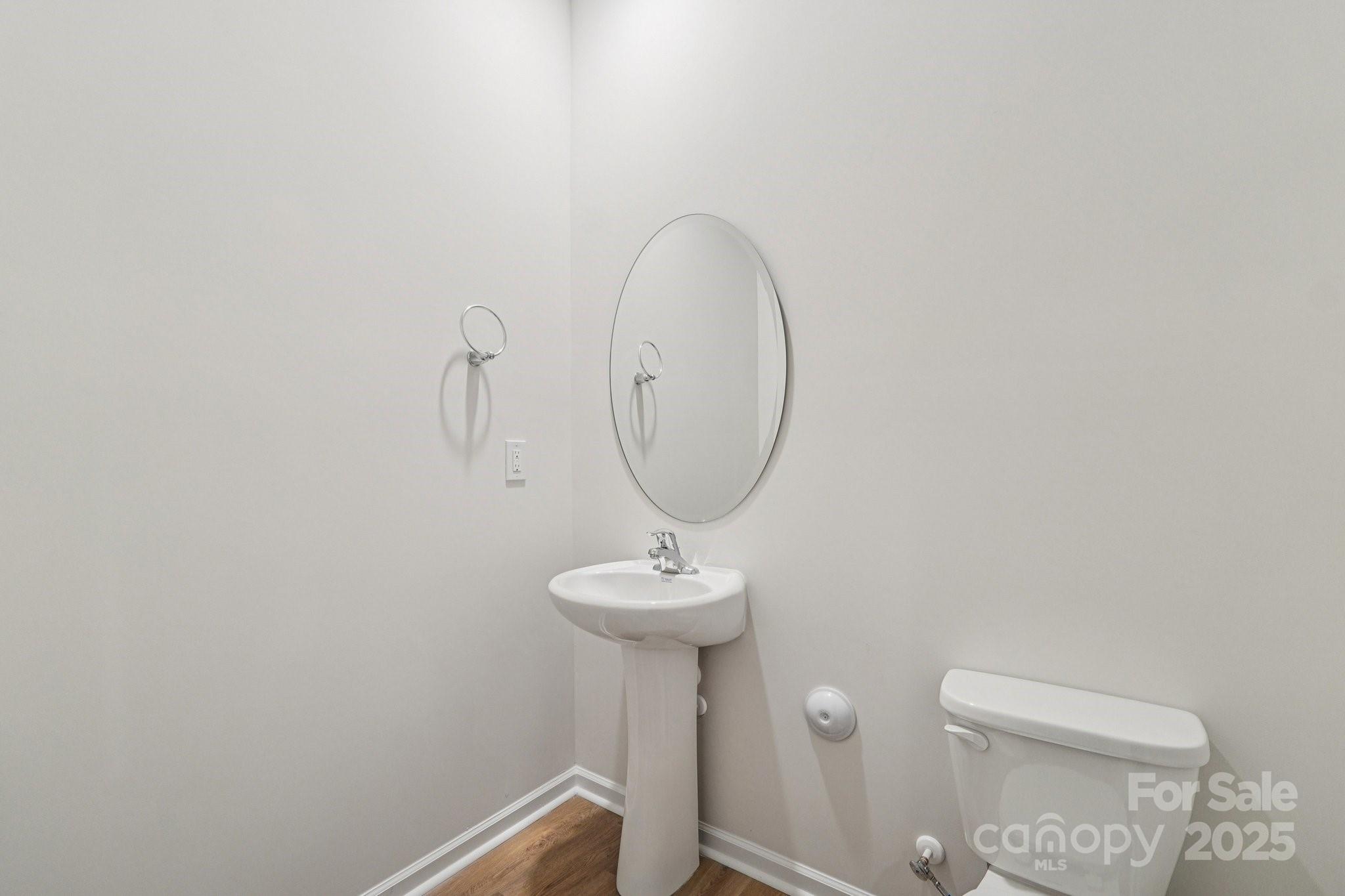 7636 Bainbridge Road Sherrills Ford, NC 28673 - Photo 15 of 31 a bathroom with a sink and a mirror