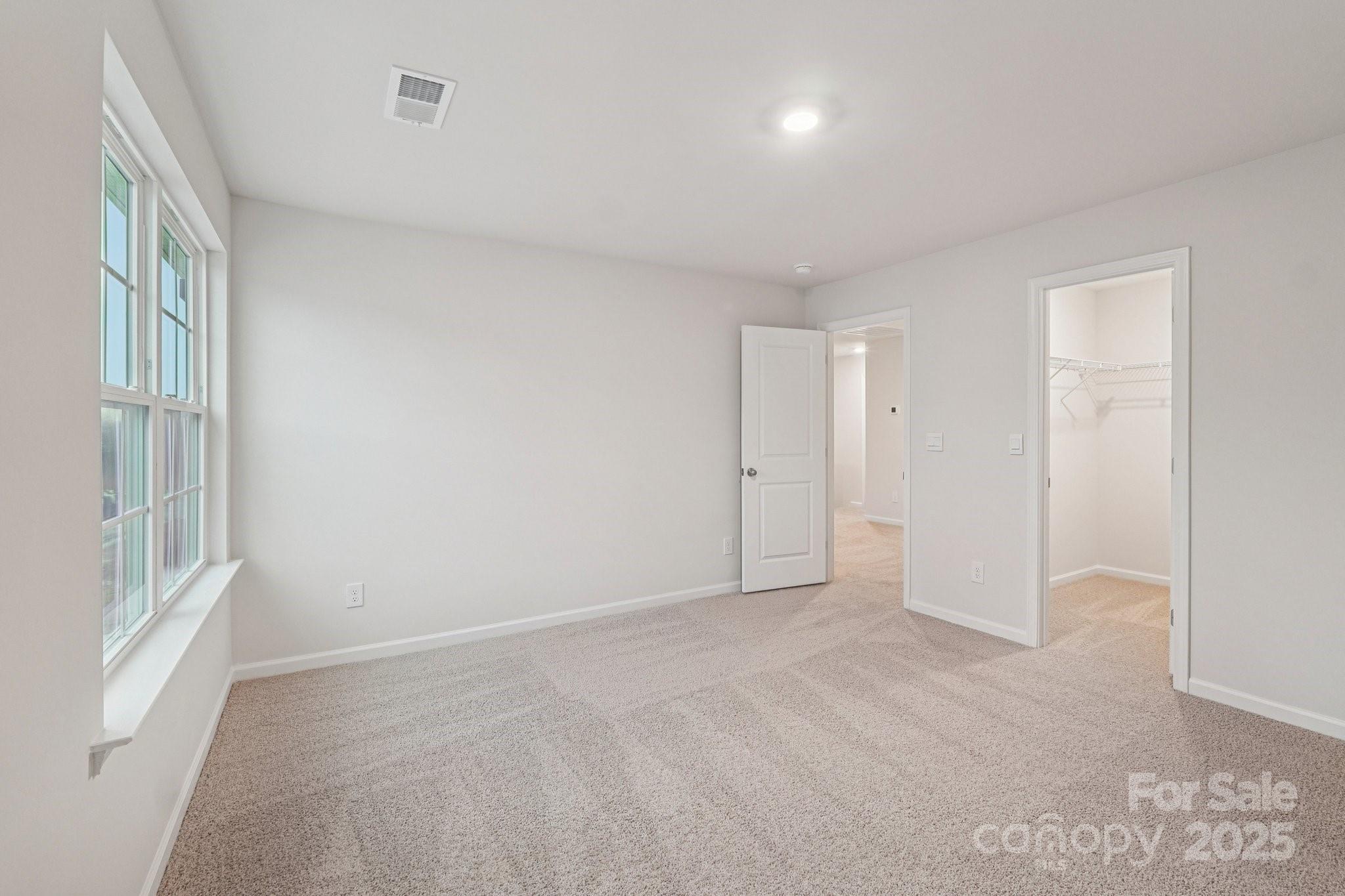 7636 Bainbridge Road Sherrills Ford, NC 28673 - Photo 23 of 31 a view of an empty room with a window