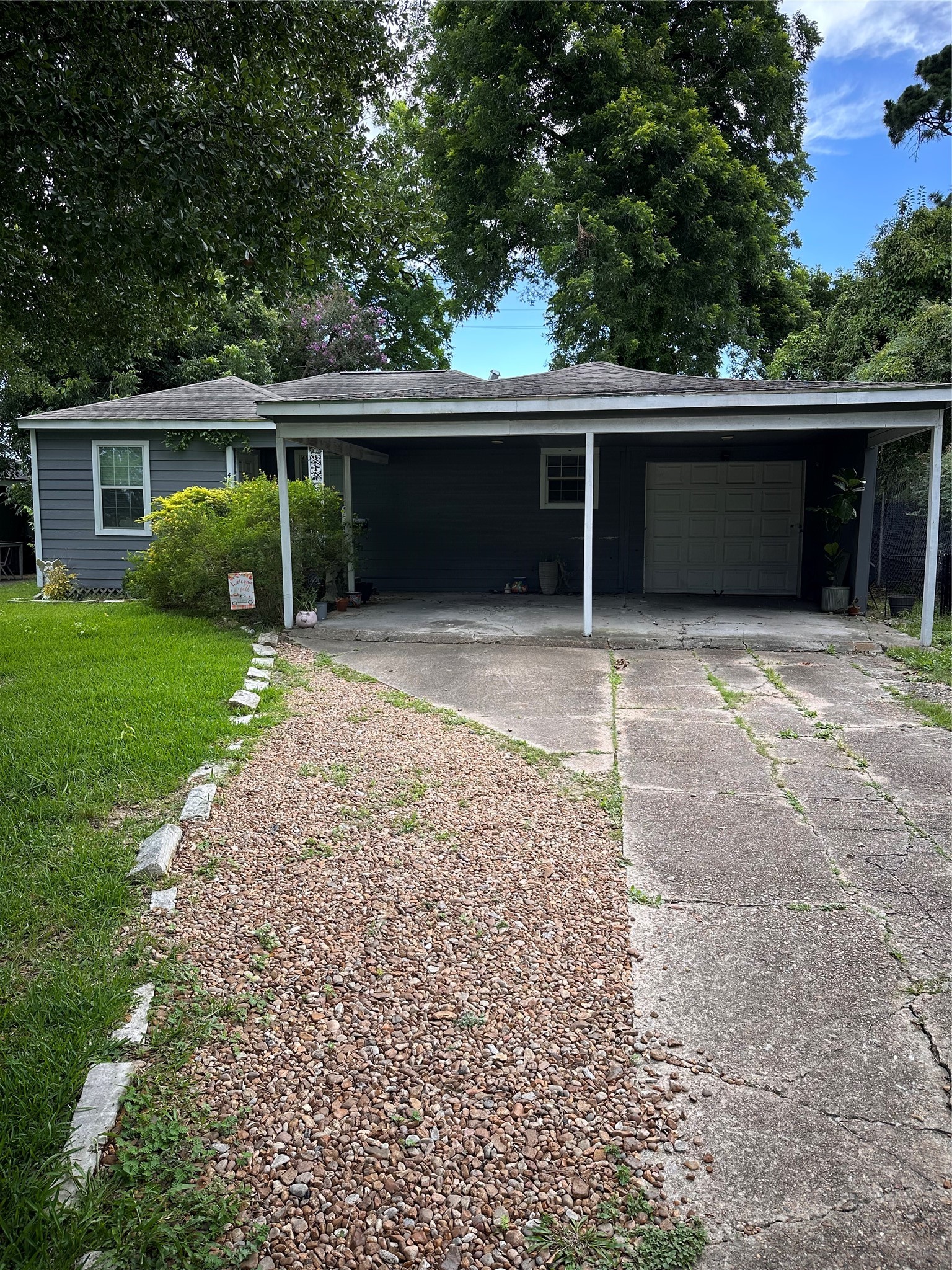 front view of a house with a yard
