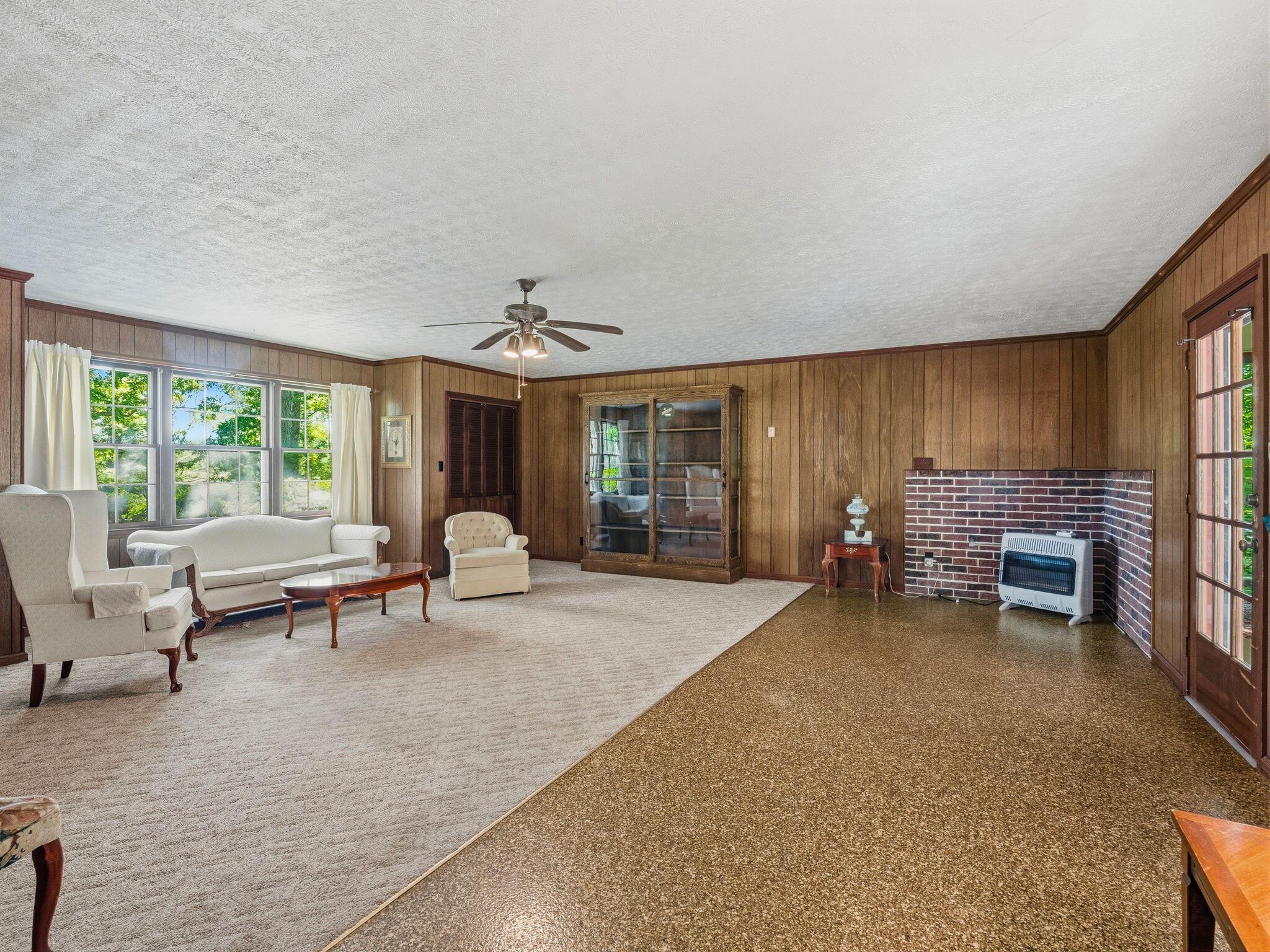 1115 Robin Ridge Road Henry, VA 24102 - Photo 15 of 54 a living room with furniture and a large window