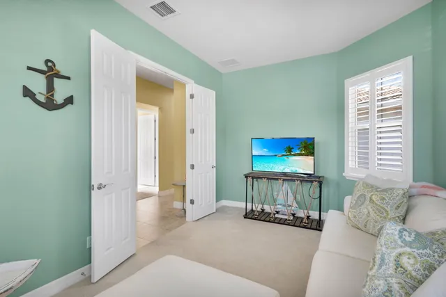 a living room with furniture and a window