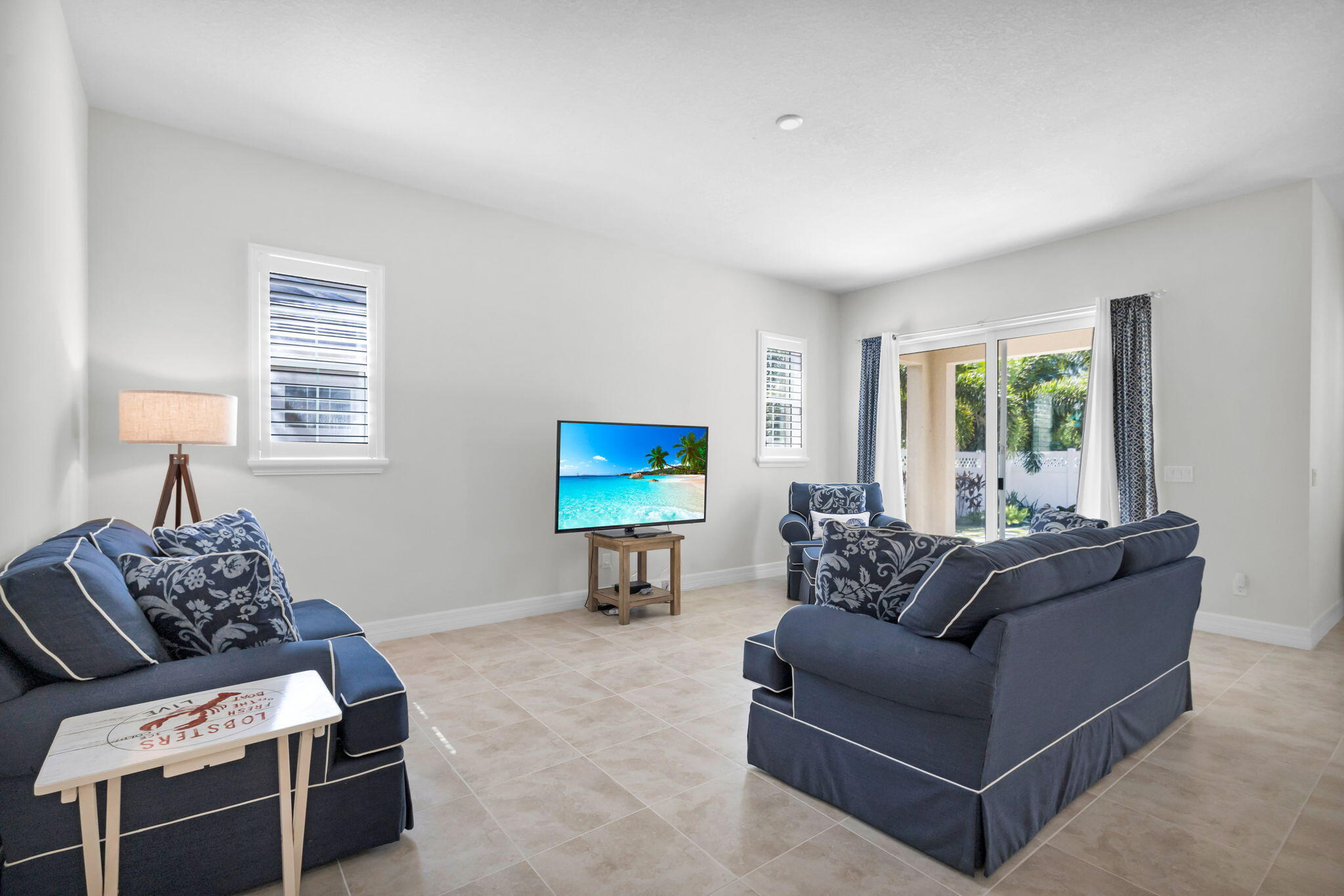 1122 South Prescott Drive Jupiter, FL 33458 - Photo 19 of 43 a living room with furniture and a window