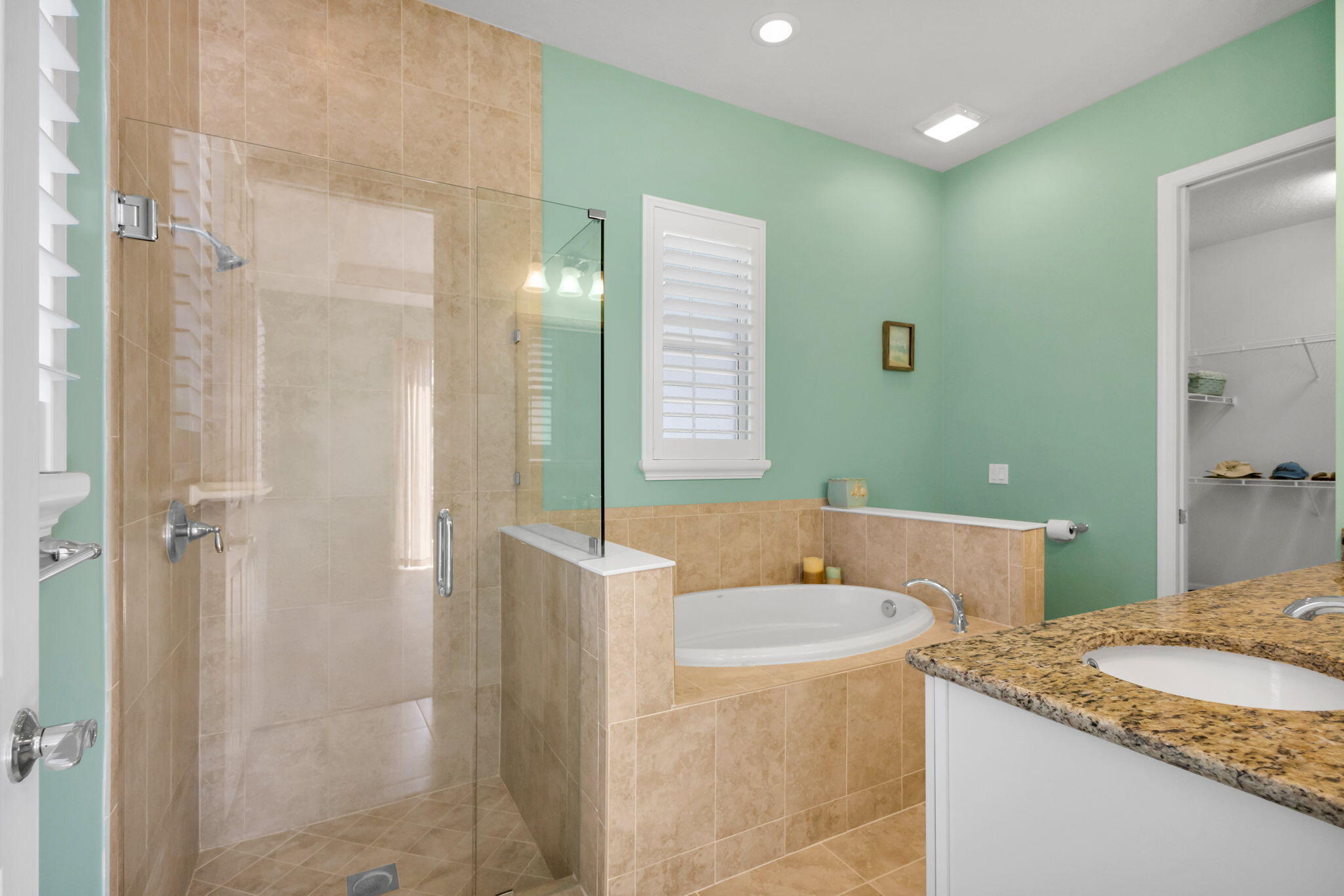 1122 South Prescott Drive Jupiter, FL 33458 - Photo 23 of 43 a bathroom with a granite countertop sink and a mirror