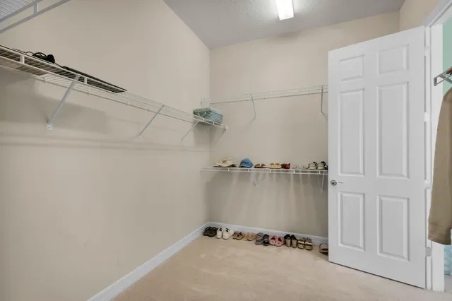 a view of small space with racks on the wall