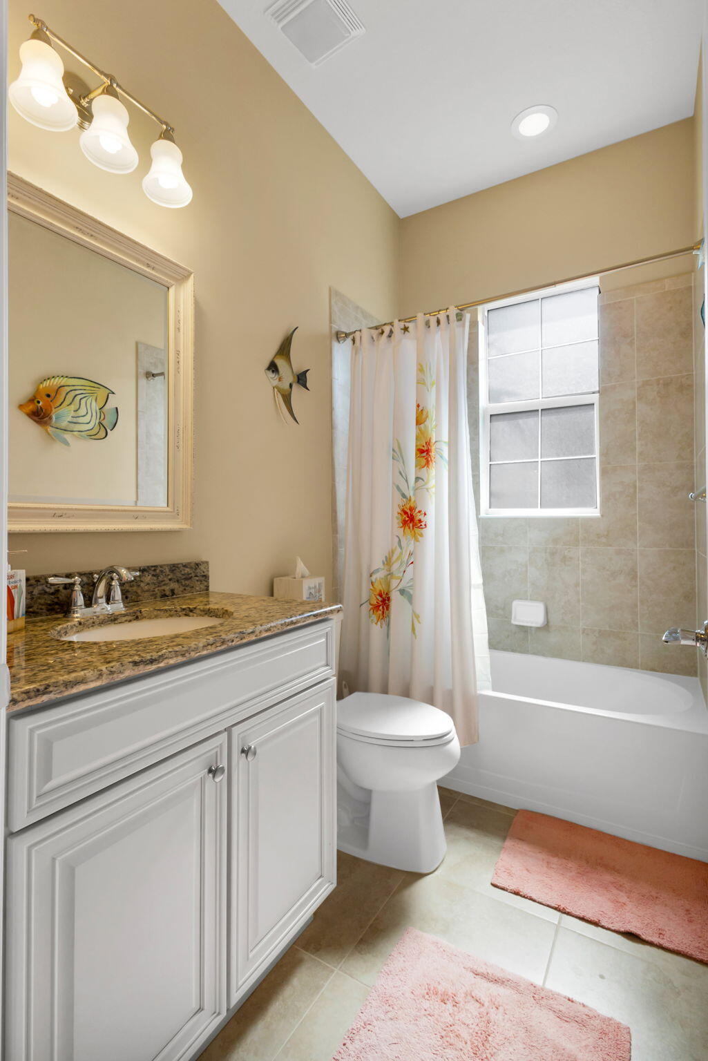 1122 South Prescott Drive Jupiter, FL 33458 - Photo 31 of 43 a bathroom with a granite countertop toilet a sink a mirror a bathtub and shower