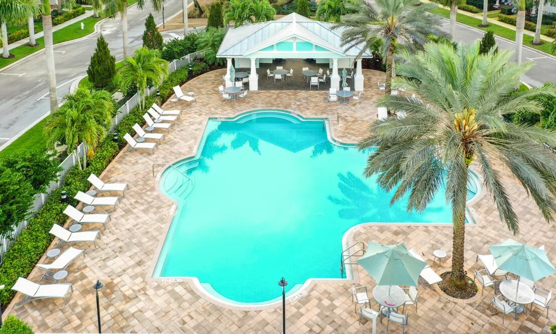 1122 South Prescott Drive Jupiter, FL 33458 - Photo 40 of 43 a view of a swimming pool with a patio