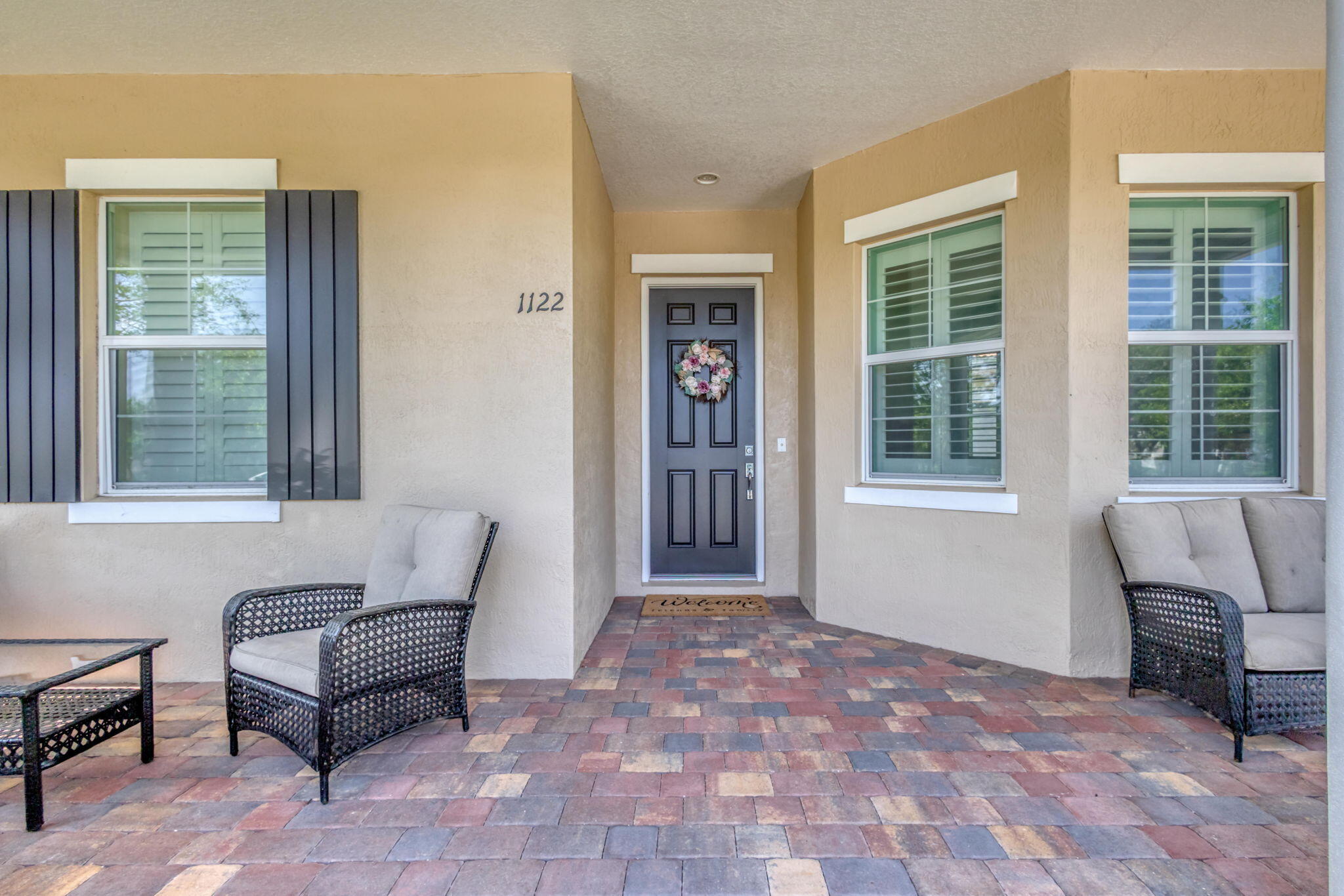 1122 South Prescott Drive Jupiter, FL 33458 - Photo 4 of 43 a living room with furniture and windows