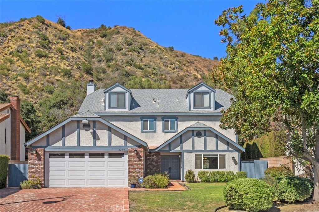 3249 Brookridge Road Duarte, CA 91010 - Photo 1 of 1 a front view of a house with a yard