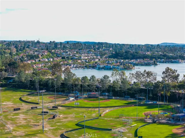 a view of a swimming pool and a yard