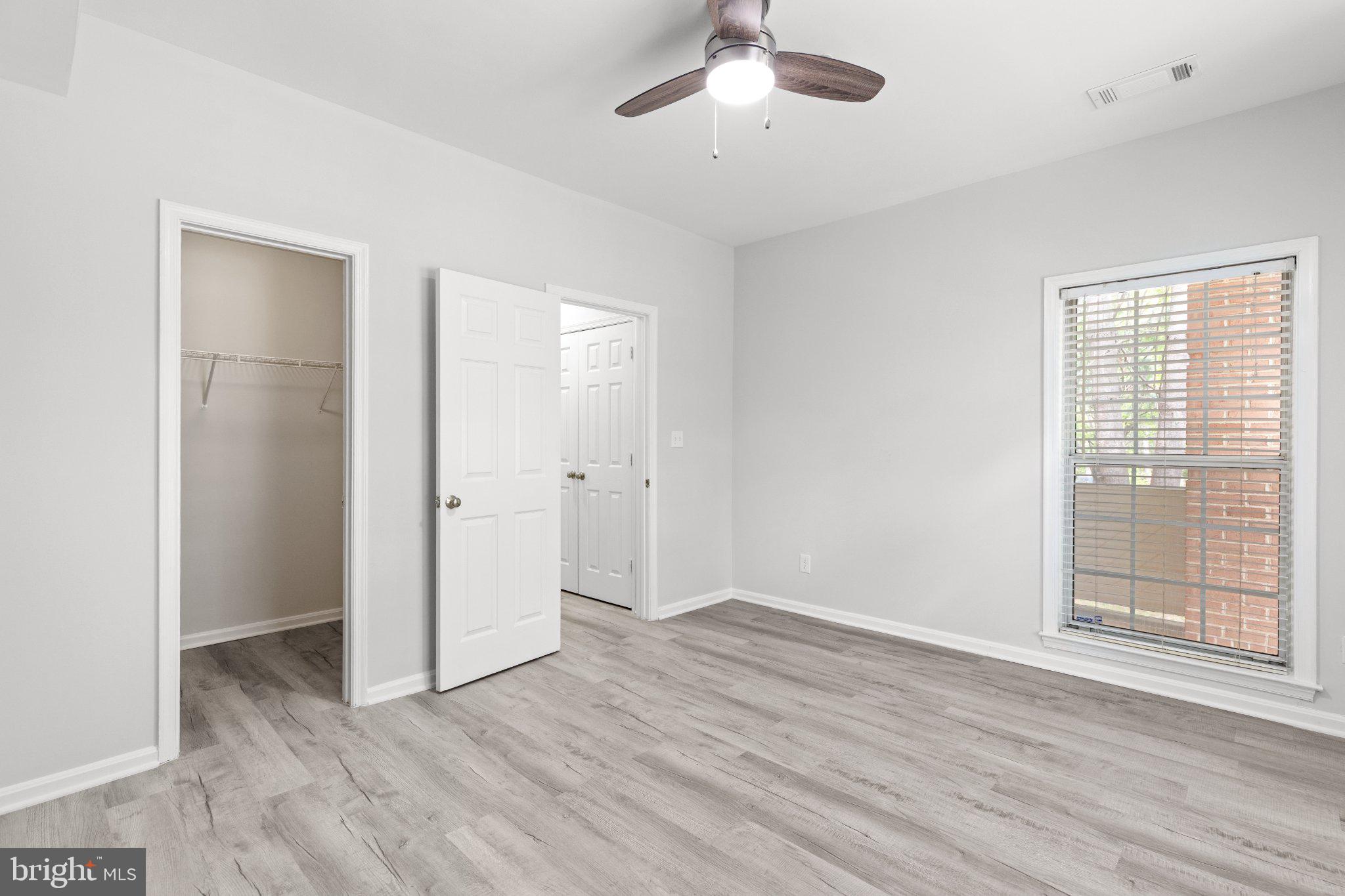 1318 Garden Wall Circle, Unit 213 Reston, VA 20194 - Photo 16 of 22 Bright and airy bedroom retreat.