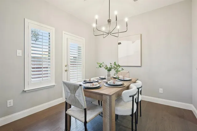 a kitchen with granite countertop cabinets and white stainless steel appliances