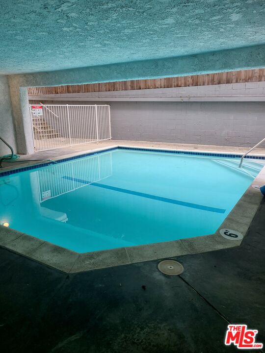 1515 South Beverly Drive, Unit 201 Los Angeles, CA 90035 - Photo 20 of 22 a view of a air conditioner from a yard