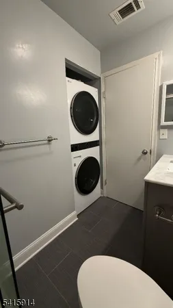 a bathroom with a toilet and a sink