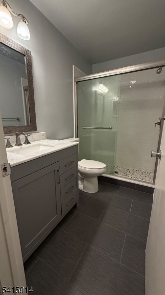 69 Mayfield Road Bedminster, NJ 07921 - Photo 5 of 5 a bathroom with a sink mirror vanity and toilet