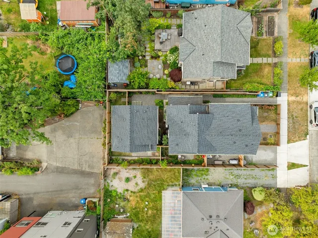 aerial view of a house with a yard