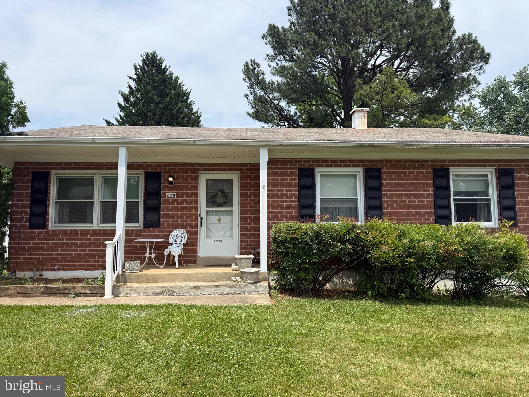 228 Northway Road Reisterstown, MD 21136 - Photo 1 of 3 front view of a house with a yard