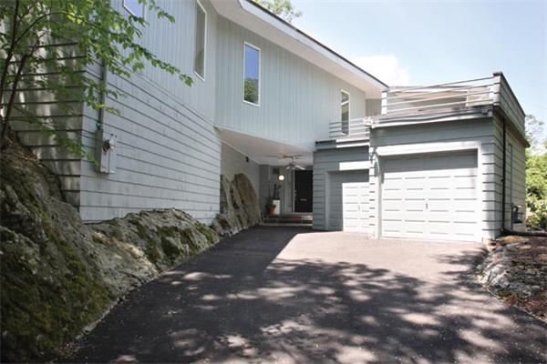 80 Hallwood Road Brookline, MA 02467 - Photo 11 of 11 a view of a house with a garage