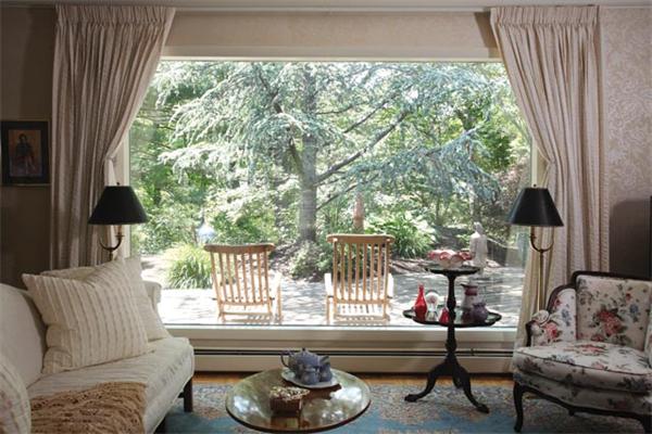 80 Hallwood Road Brookline, MA 02467 - Photo 4 of 11 a living room with furniture and a large window