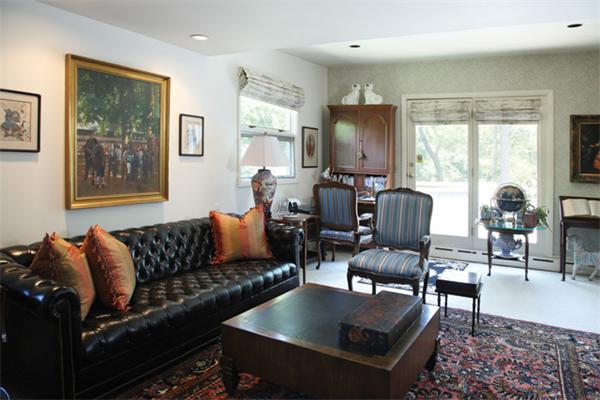 80 Hallwood Road Brookline, MA 02467 - Photo 6 of 11 a living room with furniture and a flat screen tv