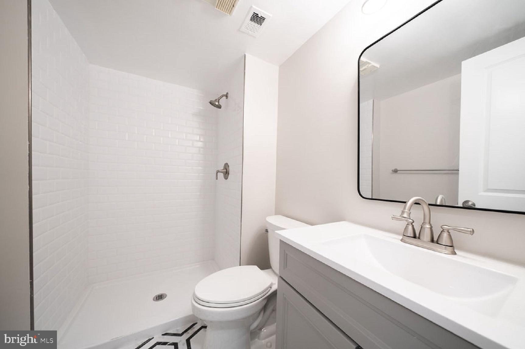 5505 Seminary Road, Unit 103N Falls Church, VA 22041 - Photo 28 of 59 a bathroom with a sink toilet and shower