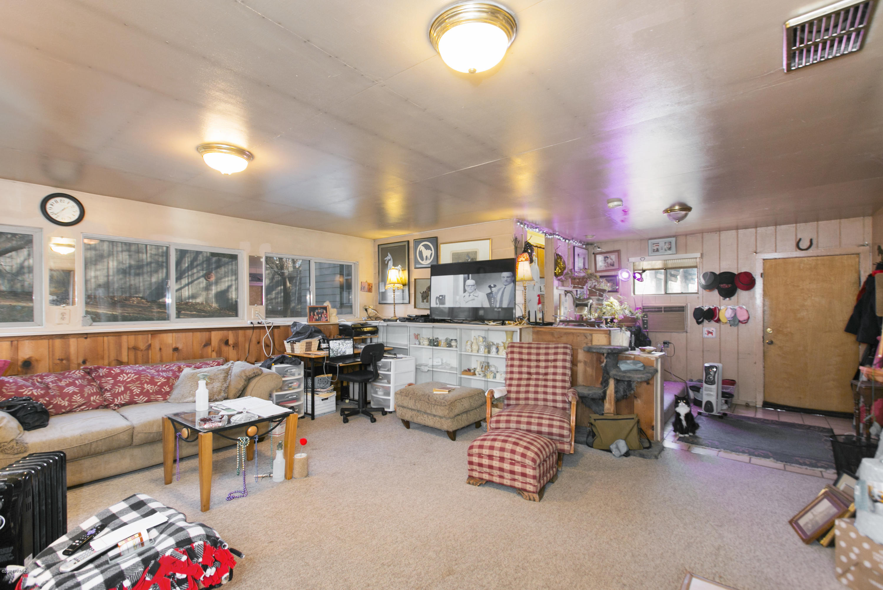 10509 Summitview Road Yakima, WA 98908 - Photo 3 of 17 a living room with furniture and a large window