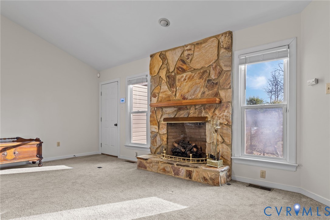 518 Rebel Ridge Road Colonial Heights, VA 23834 - Photo 11 of 44 a living room with furniture and a fireplace