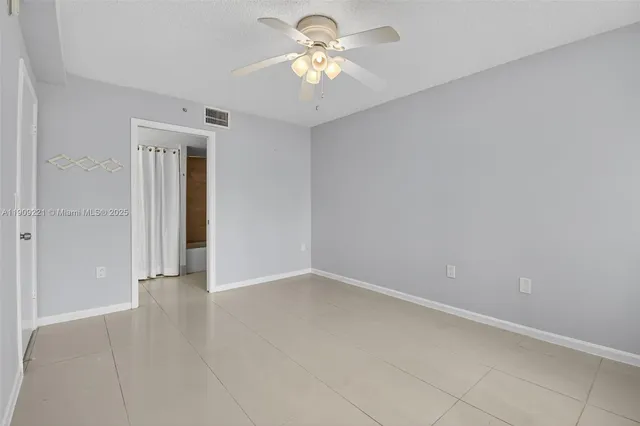 a bathroom with a toilet and a bathtub