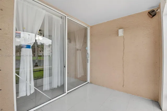 a view of a street with an outdoor space