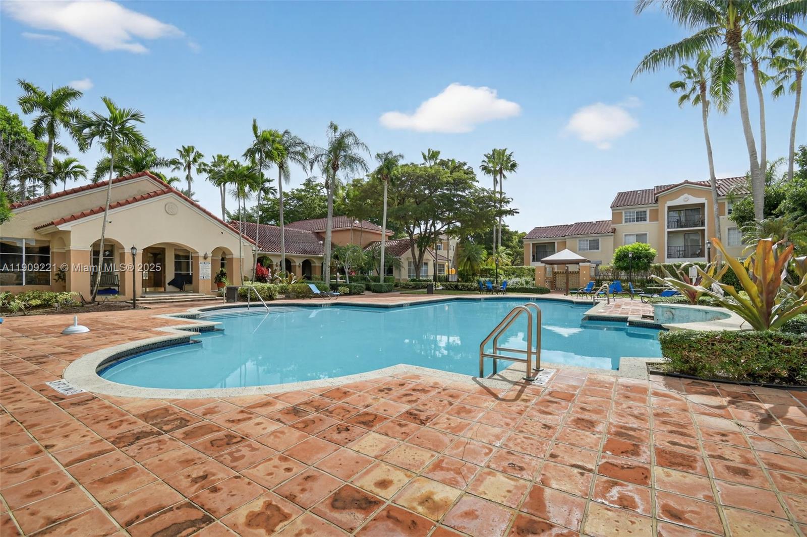 2123 Renaissance Boulevard, Unit 104 Miramar, FL 33025 - Photo 30 of 34 a view of house with outdoor space and swimming pool