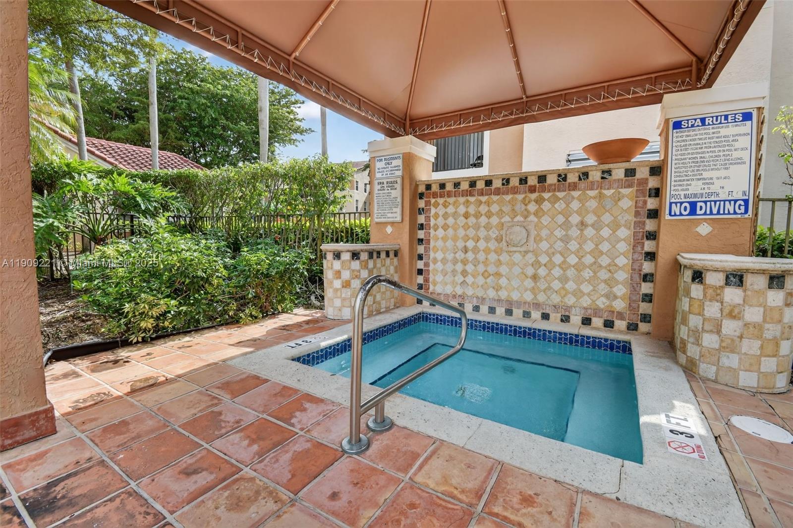 2123 Renaissance Boulevard, Unit 104 Miramar, FL 33025 - Photo 31 of 34 a view of a street with an outdoor space