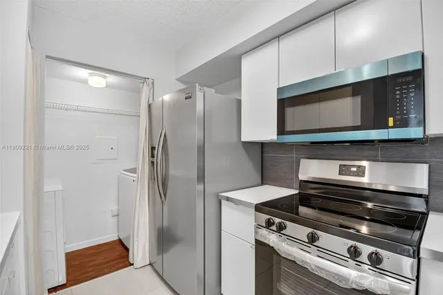 a room with furniture and a chandelier