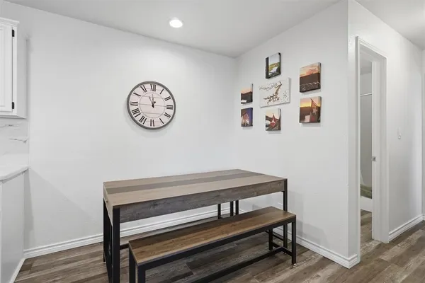 a bedroom with bed and window