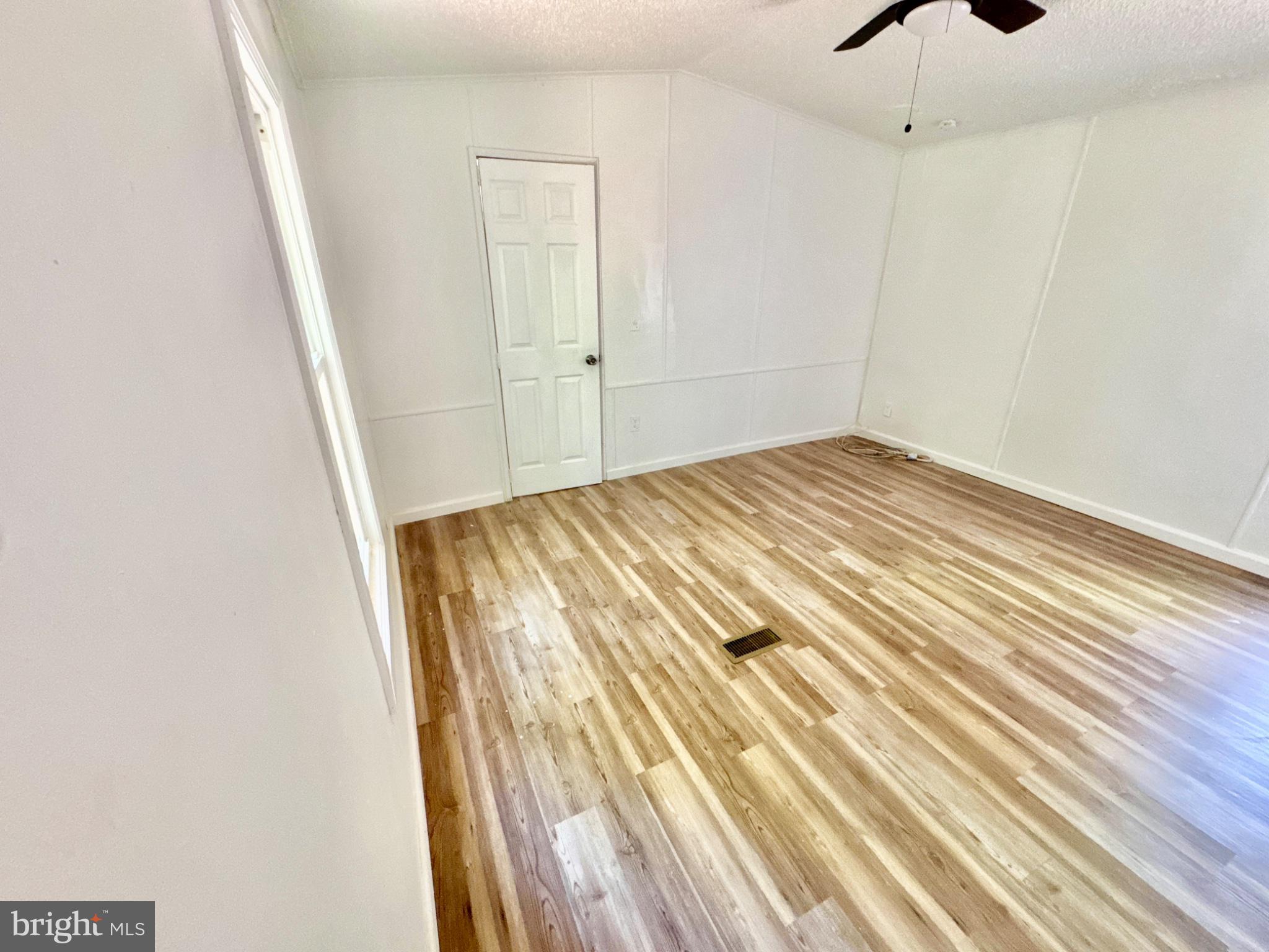 448 Evergreen Road Millville, NJ 08332 - Photo 20 of 25 a view of hallway with wooden floor