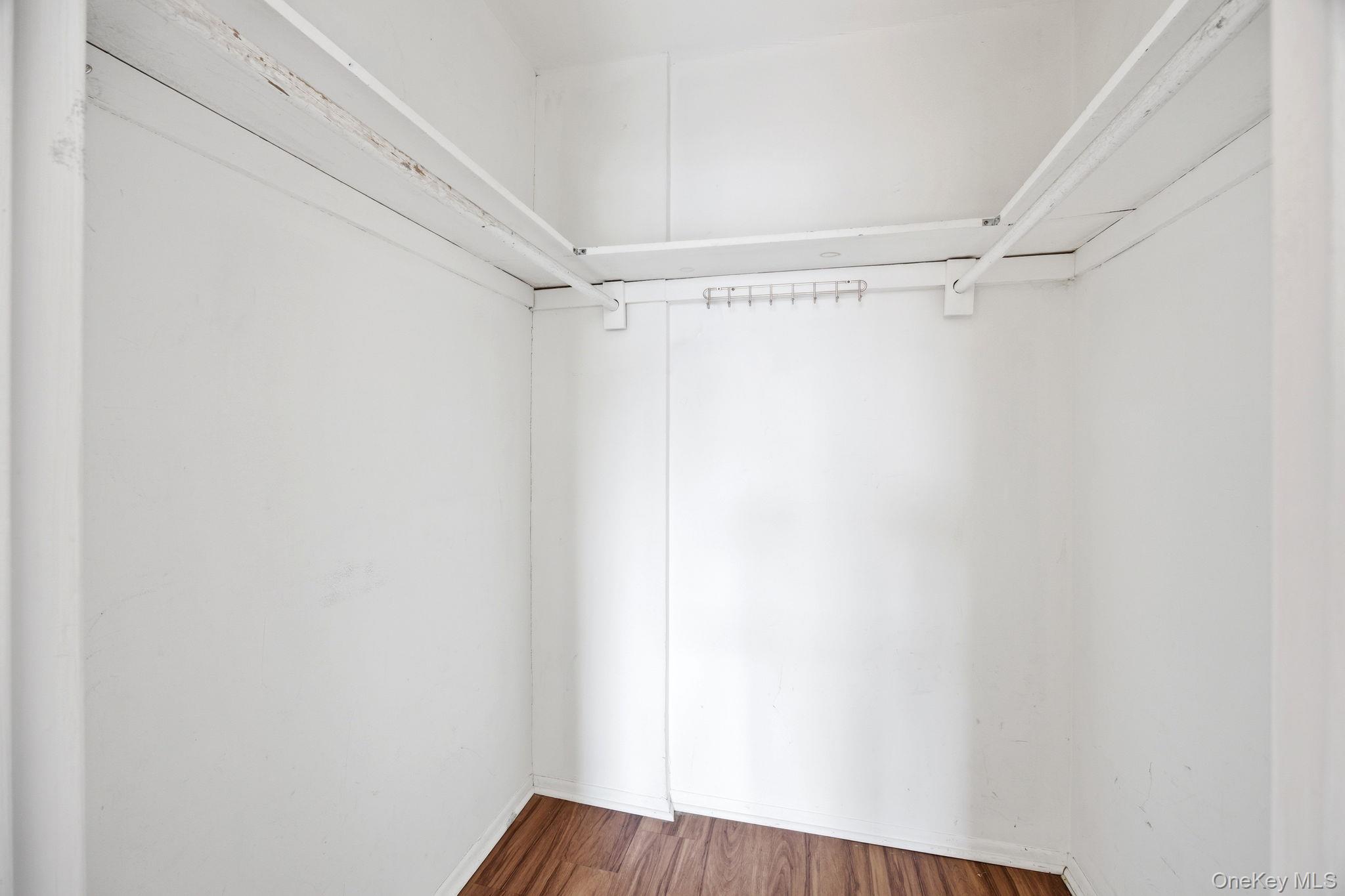 49-12 111th Street Queens, NY 11368 - Photo 25 of 31 a view of a room with wooden floor