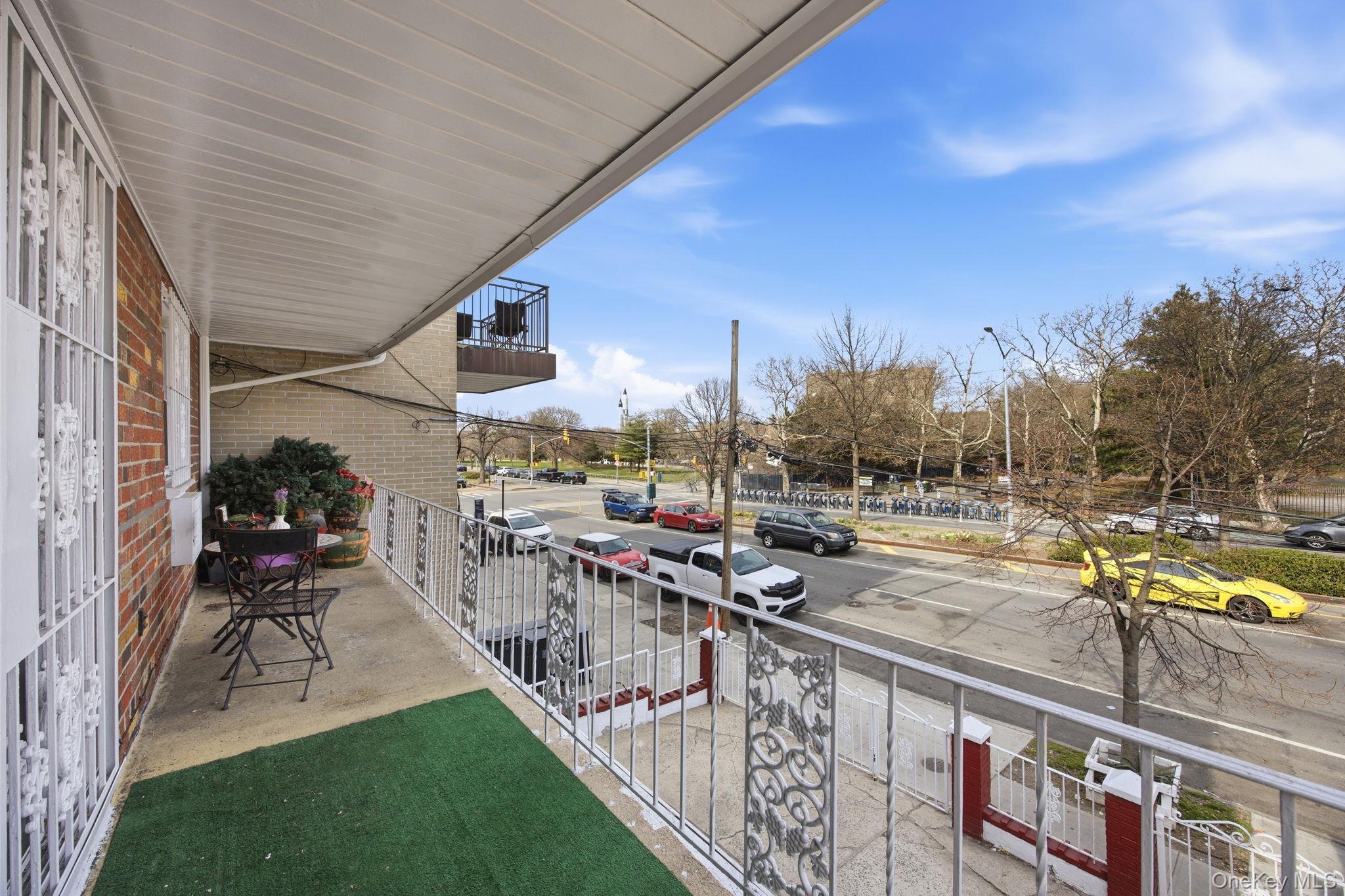 49-12 111th Street Queens, NY 11368 - Photo 9 of 31 a view of a swimming pool with outdoor seating and plants