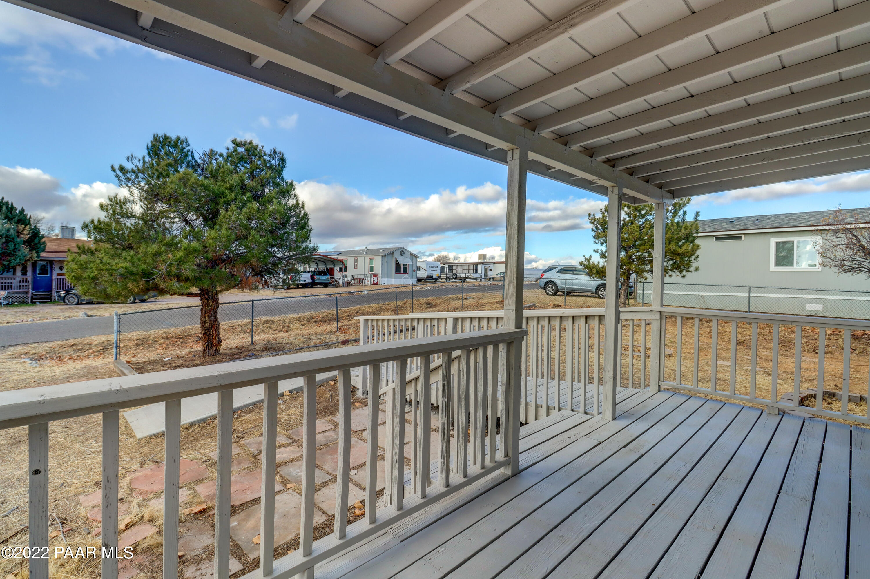 1330 Prairiegrass Road Chino Valley, AZ 86323 - Photo 25 of 31 a view of balcony with wooden floor