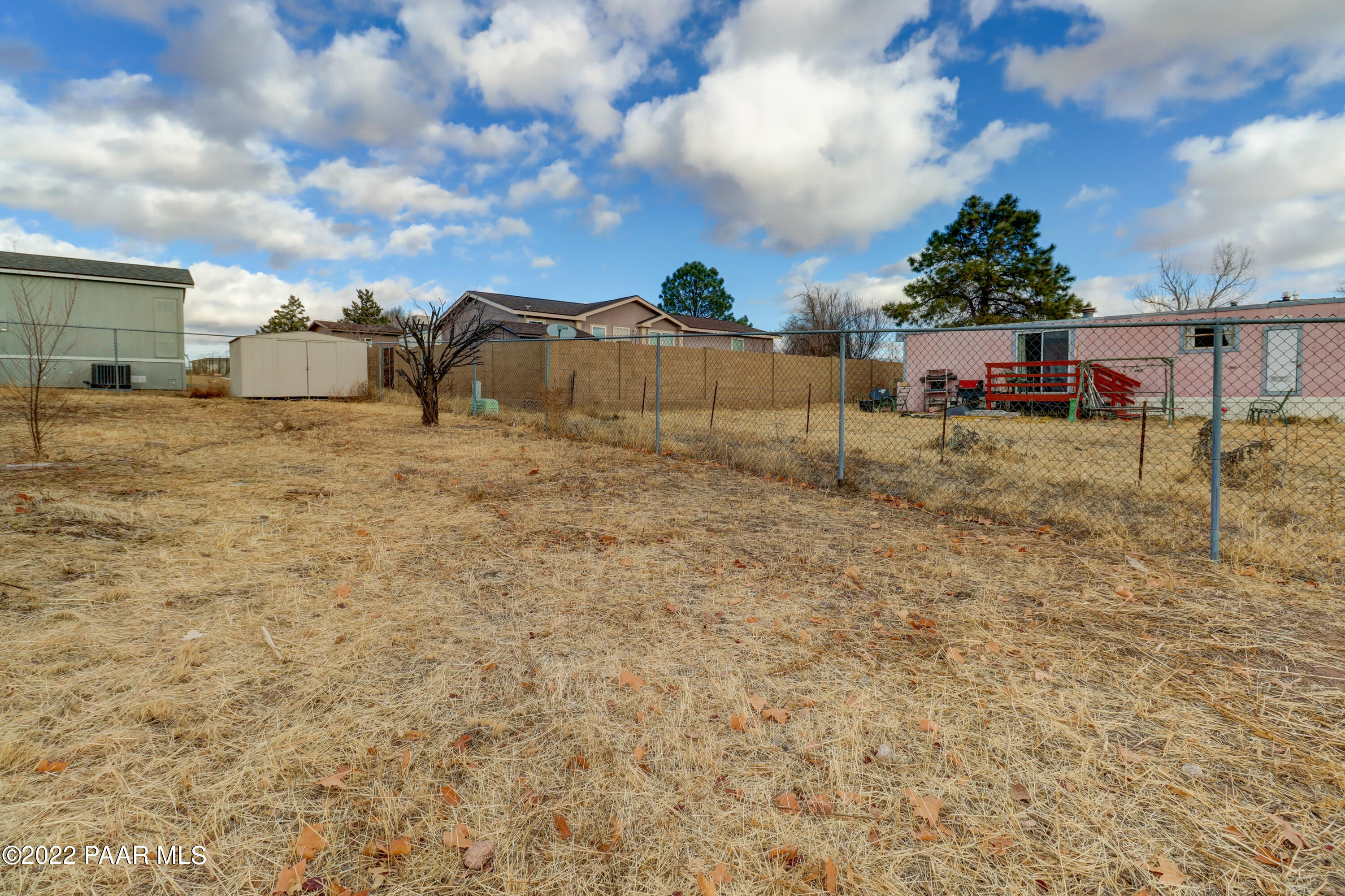 1330 Prairiegrass Road Chino Valley, AZ 86323 - Photo 31 of 31 a backyard of a house