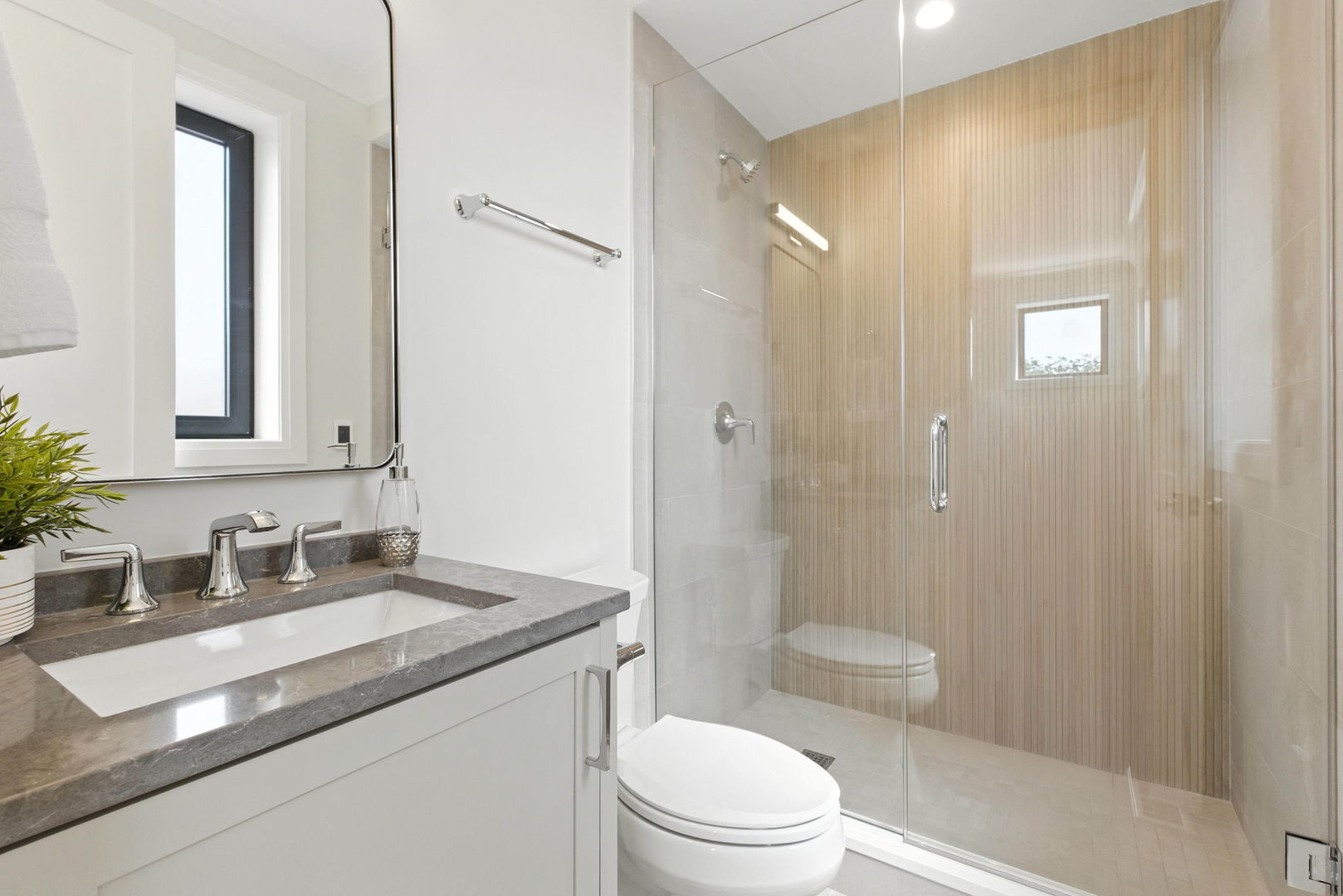 908 West Fullerton Avenue, Unit PH Chicago, IL 60614 - Photo 17 of 23 a bathroom with a granite countertop sink a toilet and shower