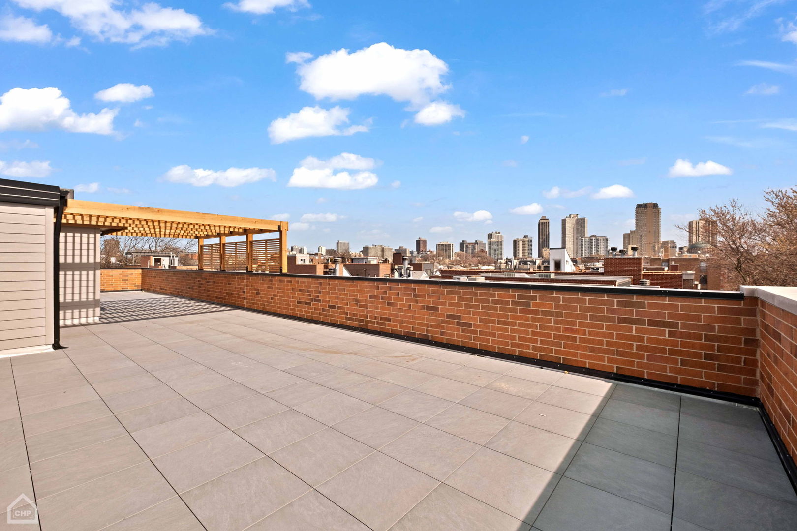 908 West Fullerton Avenue, Unit PH Chicago, IL 60614 - Photo 21 of 23 a view of a terrace with city view