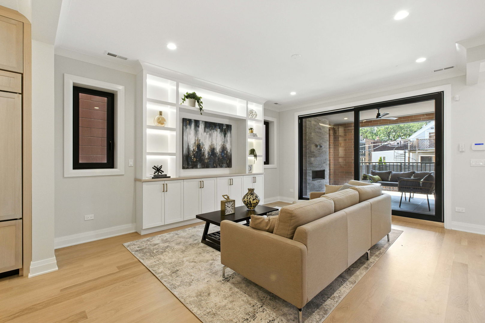 908 West Fullerton Avenue, Unit PH Chicago, IL 60614 - Photo 7 of 23 a living room with furniture and a flat screen tv