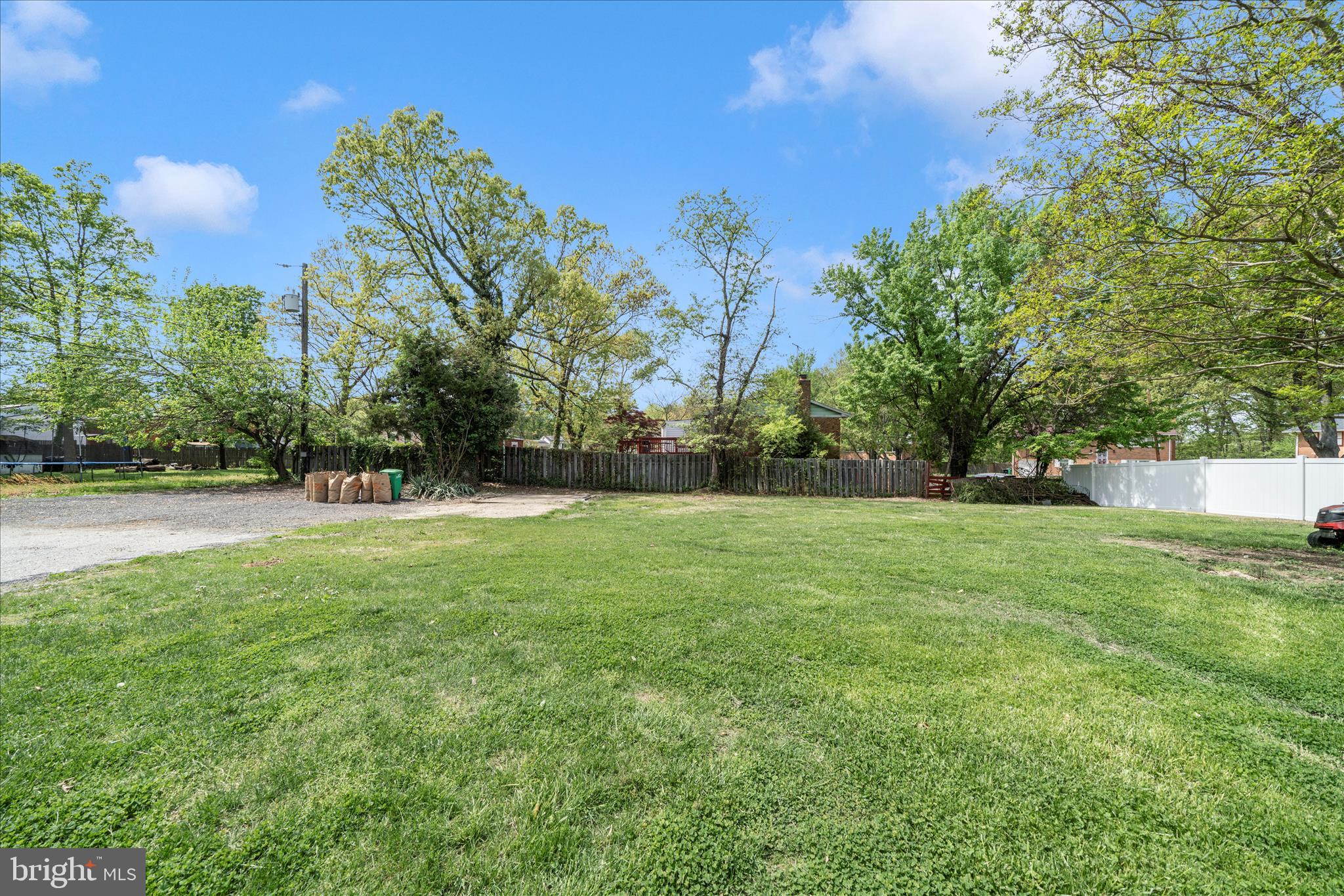6737 Allentown Road Temple Hills, MD 20748 - Photo 11 of 51 a view of outdoor space with deck and trees