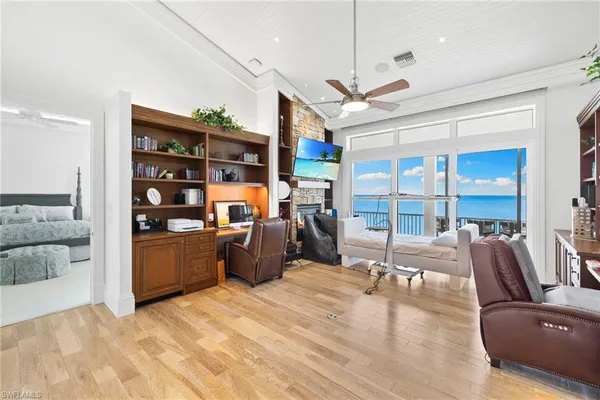 a view of a livingroom with porch and furniture