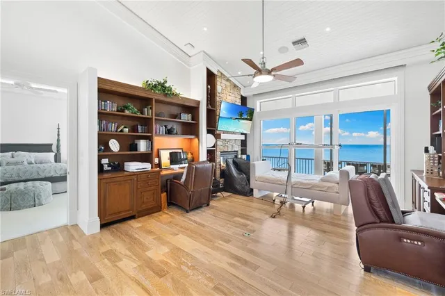 a view of a livingroom with porch and furniture