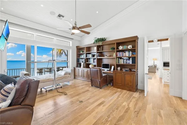 a view of a livingroom with furniture and window