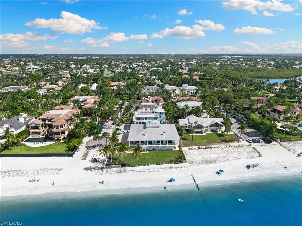 40 32nd Avenue South Naples, FL 34102 - Photo 4 of 49 Aerial perspective of suburban area featuring unending shoreline