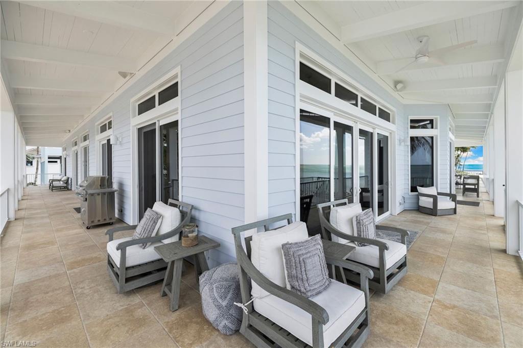 40 32nd Avenue South Naples, FL 34102 - Photo 39 of 49 View of patio featuring grilling area, french doors, and a ceiling fan