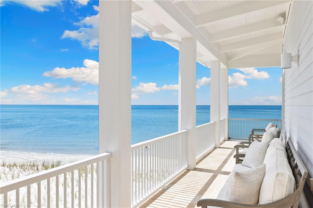 40 32nd Avenue South Naples, FL 34102 - Photo 41 of 49 Balcony with view of water and beach