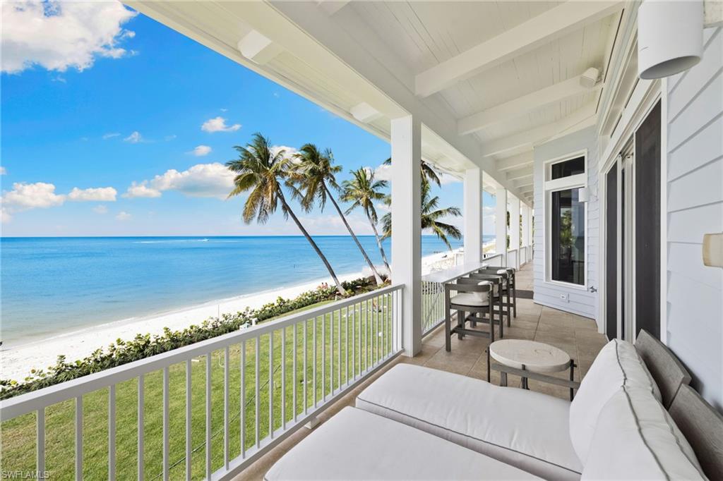 40 32nd Avenue South Naples, FL 34102 - Photo 42 of 49 Balcony with view of water and beach
