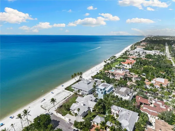 an aerial view of beach and ocean